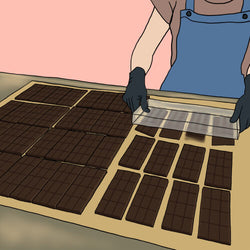 An illustration of chocolate bars being turned out of their molds 