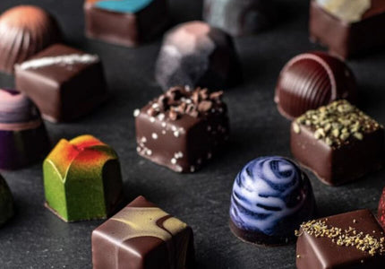 A collection of various colorful Monsoon Chocolate bon bons