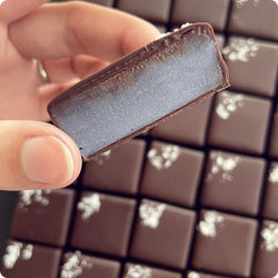 A person holding a limited edition Monsoon Chocolate treat